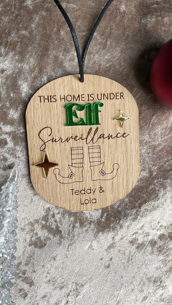 This house is under elf surveillance personslised bauble